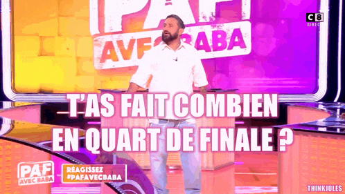 a man with a beard is standing in front of a sign that says paf avec baba