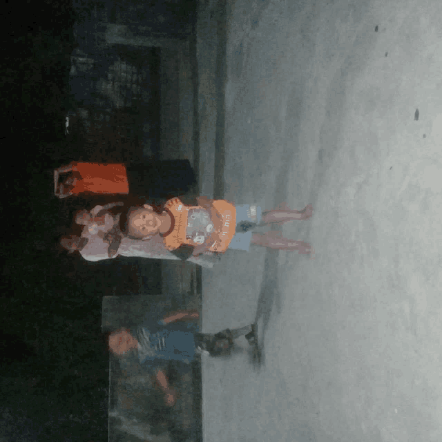 a young boy wearing a shirt that says ' snoopy ' on it