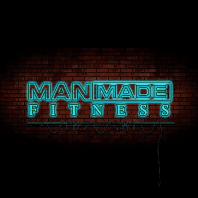 a neon sign that says manmade fitness on it