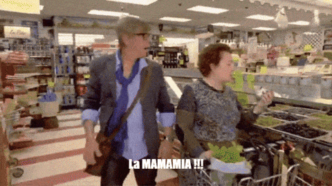a man and a woman in a grocery store with the words la mamamia written on the bottom