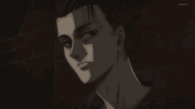 a close up of a man 's face with the letters nhk g visible