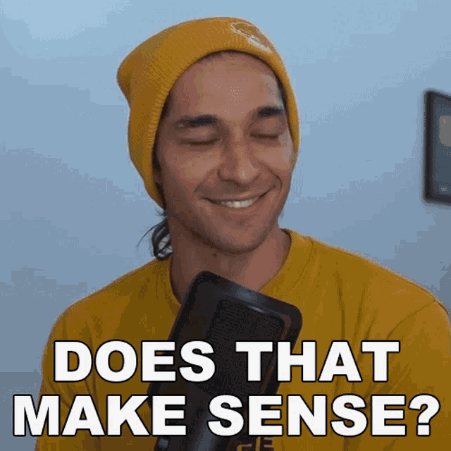 a man wearing a yellow beanie and a yellow shirt is smiling and asking does that make sense