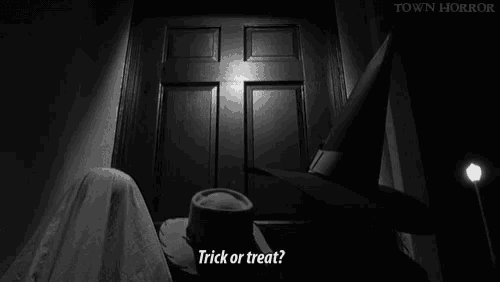 a black and white photo of a man in a tuxedo asking trick or treat