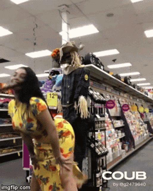 a woman in a yellow dress is dancing in a store with coub written on the bottom right