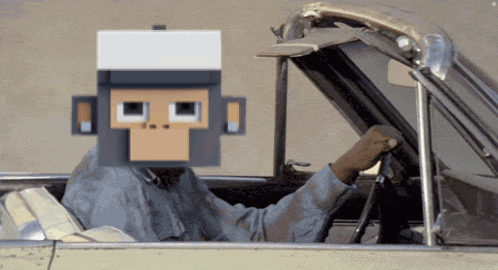 a man in a car with a monkey face on his face
