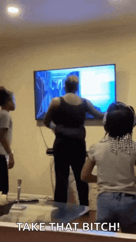 a group of people are playing a video game with the words take that bitch written on the bottom
