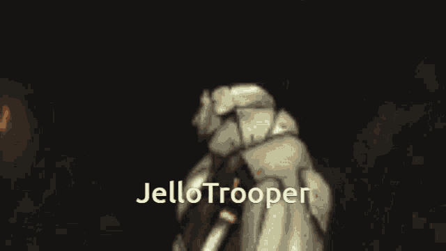 a blurred image of a person with the words jello trooper on the bottom right