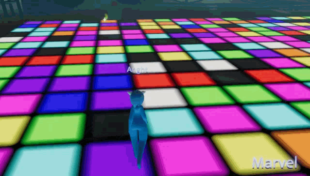 a person standing on a colorful dance floor with the word marvel on the bottom right