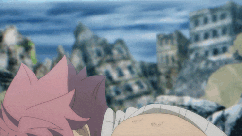 a person with pink hair is laying on the ground in front of a building