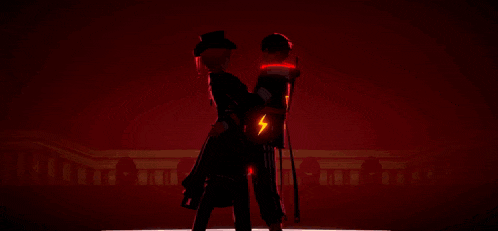 a man and a woman are standing next to each other and holding hands in front of a red background .
