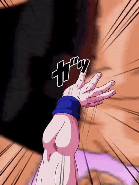 a close up of a person 's hand with a blue wristband that says ' t ' on it