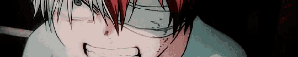 a close up of a person 's face with a bandage on his head .