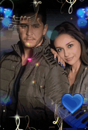 a man and a woman are standing next to each other with a blue heart in the middle