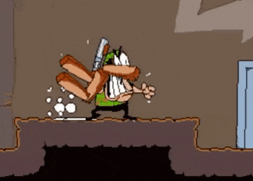 a cartoon character is holding a gun and a bunch of bricks in his mouth .