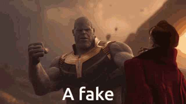thanos is standing next to doctor strange and the words a fake are on the screen