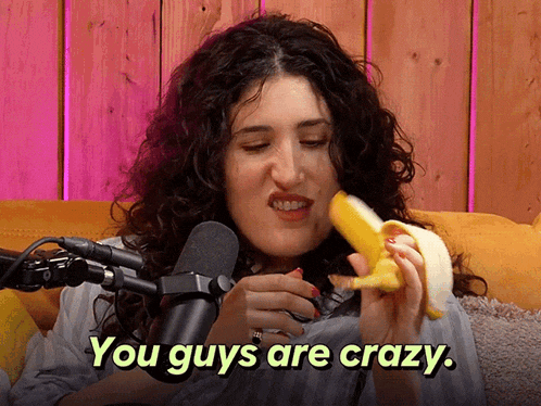 a woman eating a banana with the words " you guys are crazy " behind her
