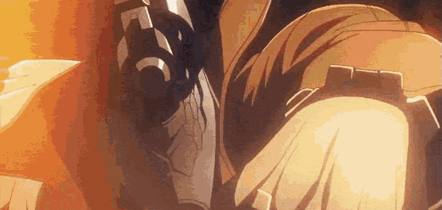 a close up of a person 's arm with a sword in it .