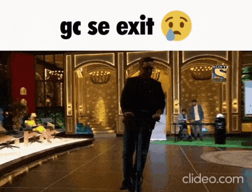 a video of a man riding a scooter with the words gc se exit written on the bottom