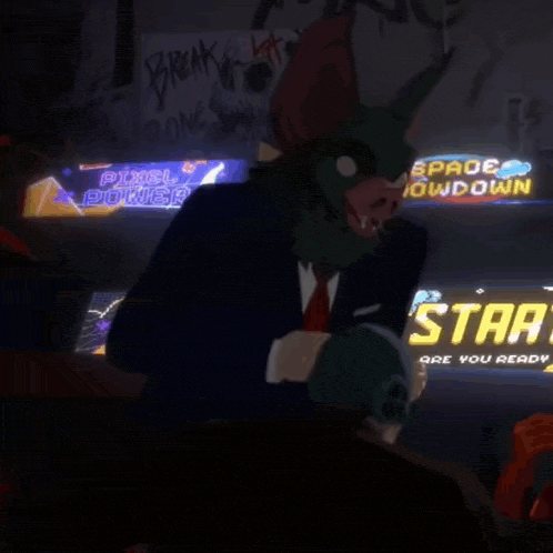 a man with a bat mask is sitting in front of a sign that says start