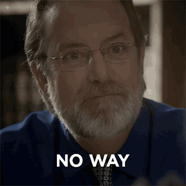 a man with glasses and a beard has the word no way on his face