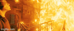 a man standing in front of a fire with imgflip.com written on the bottom right