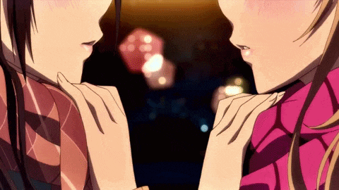 two anime girls are touching each other 's faces with their hands