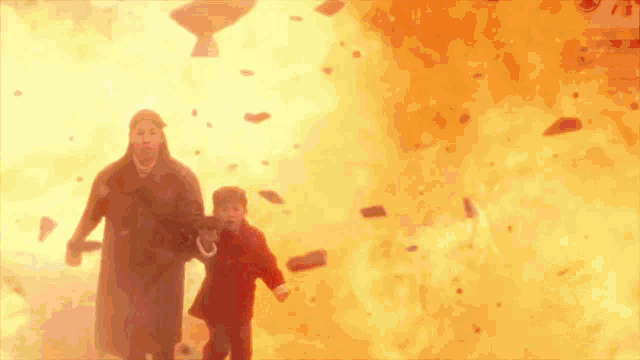 a woman and child are running from a fireball