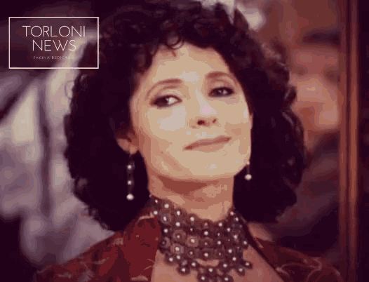 a picture of a woman with a torloni news advertisement