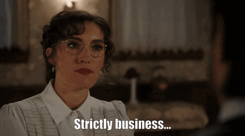 a woman in glasses says strictly business