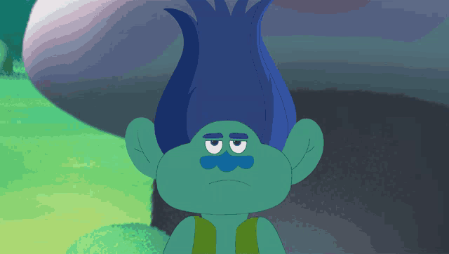 a troll with blue hair and a blue mustache is looking sad
