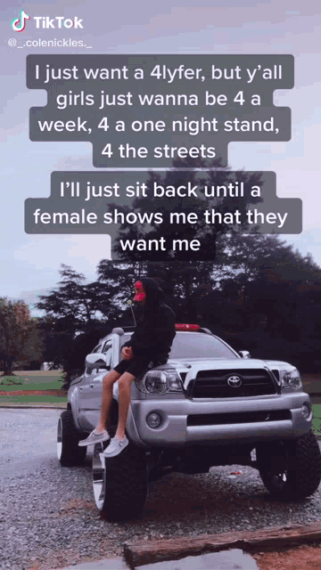 a man is sitting on the front of a toyota truck with a tiktok caption