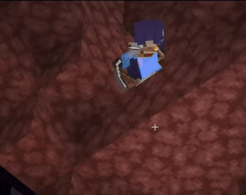 a person in a blue shirt is laying on the ground in a minecraft world