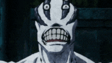 a close up of a cartoon character 's face with a very large mouth .