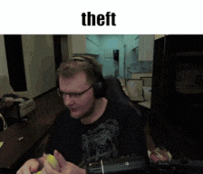 a man wearing headphones is eating a banana and the word theft is on the bottom