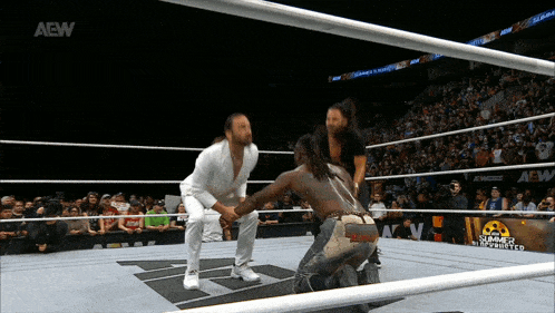 a wrestling match is being broadcasted on aew