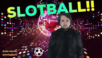 a man stands in front of a disco ball with the words slotball written on it