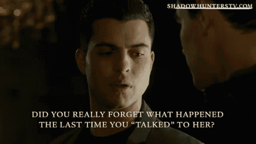 a man talking to another man with shadowhunterstv.com at the bottom