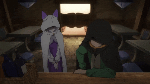 a man and a woman are sitting at a table