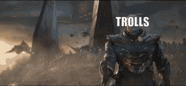 a man in armor stands in front of a crowd with the word trolls written on the bottom