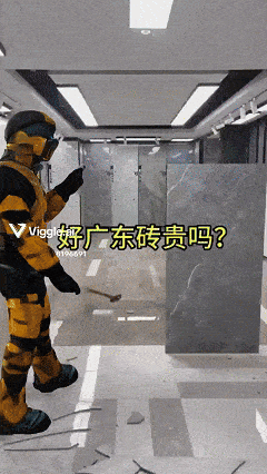 a man in a yellow and black suit is standing in a room with chinese characters on the floor