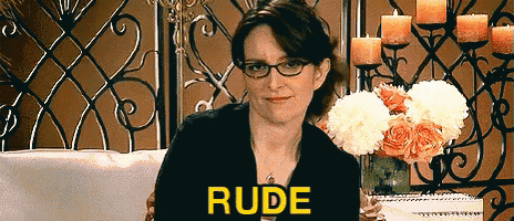 a woman with glasses is holding a vase of flowers and the word rude is on the screen