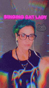 a woman with green hair is wearing headphones and a shirt that says singing cat lady