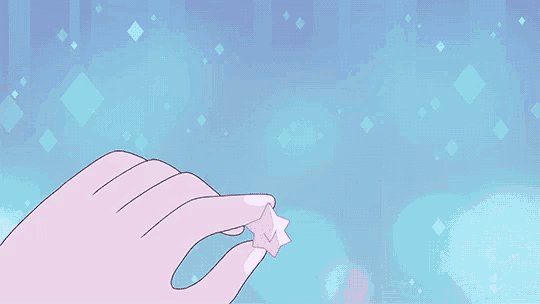 a girl and a cat are sitting next to each other and looking at a diamond .
