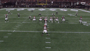 a football player with the number 58 on his jersey is running on the field