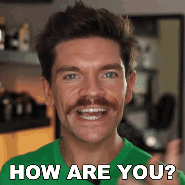 a man with a mustache is smiling with the words how are you behind him
