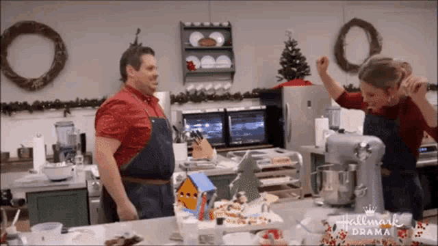 a man and a woman are standing in a kitchen with the words hallmark drama on the bottom