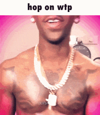 a man without a shirt is wearing a gold chain around his neck