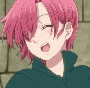 a close up of a girl with pink hair wearing a blue jacket and a green jacket .