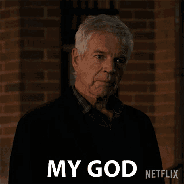 an older man is standing in front of a brick wall and says my god netflix