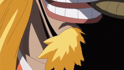 a close up of a person 's face with a yellow feather